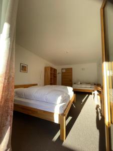 Voodi või voodid majutusasutuse Hotel Larch toas