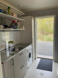 Kuchyň nebo kuchyňský kout v ubytování Kolarbo Gård B&B