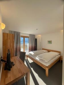 Voodi või voodid majutusasutuse Hotel Larch toas