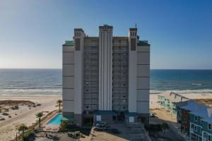 an aerial view of a hotel on the beach at Royal Palms 907 in Gulf Shores