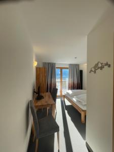 Voodi või voodid majutusasutuse Hotel Larch toas