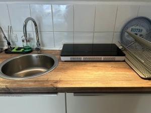 Η κουζίνα ή μικρή κουζίνα στο Ferienzimmer Teiselsmühle Gehren Heideblick +58 φωτογραφίες