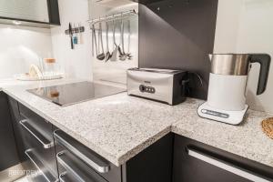 A kitchen or kitchenette at Executive Suite Schottenring