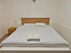 Ένα ή περισσότερα κρεβάτια σε δωμάτιο στο Pophouse