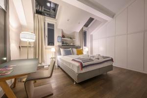 A bed or beds in a room at Executive Suite Schottenring
