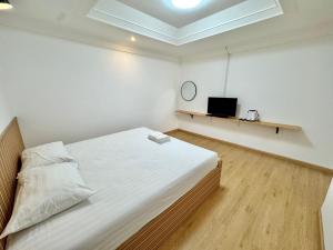 Ένα ή περισσότερα κρεβάτια σε δωμάτιο στο Pophouse