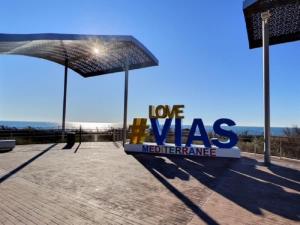 a sign that reads love was medicine maintenance at A 150m de la plage - Coquet appartement pour 4 personnes in Vias +2 photos