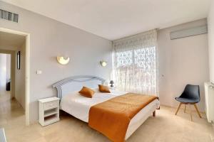 Postel nebo postele na pokoji v ubytování Magnifique appartement en front de mer