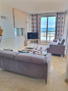 Postel nebo postele na pokoji v ubytování Magnifique appartement en front de mer