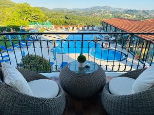 Bazén v ubytovaní Nikos Apartments Corfu alebo v jeho blízkosti