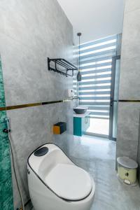 Koupelna v ubytování Goku Hotel