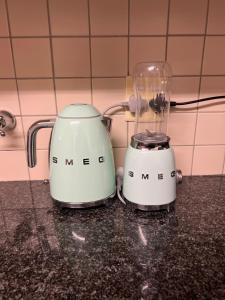 two toasters sitting on top of a counter at Maison Ruvimbo in Vosburg