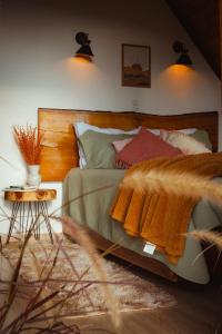 En eller flere senge i et værelse på Chalé Sunset Hills em Campos do Jordão