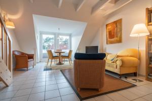 Χώρος καθιστικού στο Wohnung Zum Leuchtturm