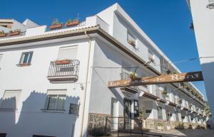 a white building with a sign that reads la maissance at Las Casas de Nani in Beas de Segura