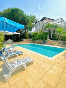 Bassenget på eller i nærheten av Atlantide - Somptueuse Villa Classée 4 étoiles - Saint-Clair - Vue Exceptionnelle - Piscine