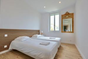 Postel nebo postele na pokoji v ubytování Cosy Muguets - Luxury Apartment for 6 People with Sea View