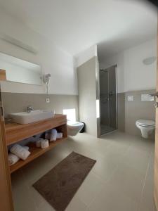 Vannituba majutusasutuses Hotel Larch