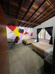 Postel nebo postele na pokoji v ubytování Hostel Urban City Medellin