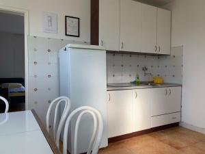 Kuchyňa alebo kuchynka v ubytovaní Marko Apartment