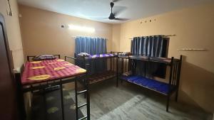 Postel nebo postele na pokoji v ubytování Empire Hostel