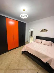 Postel nebo postele na pokoji v ubytování Ermes Center Apartment + 9 fotografií