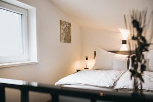 Voodi või voodid majutusasutuse Apartmány DVĚ BOBULE 1 kk toas