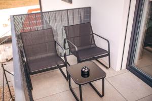Istumisnurk majutusasutuses Apartmány DVĚ BOBULE 1 kk