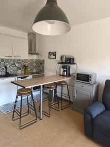 Kuchnia lub aneks kuchenny w obiekcie Location vacances Barcelonette