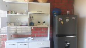 Kuchyň nebo kuchyňský kout v ubytování Hostel "La Casa de Ricky"