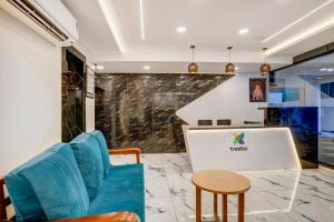 Treebo Address Inn Gachibowli的休息区