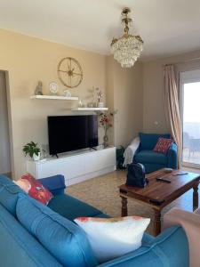 TV a/nebo společenská místnost v ubytování MARIA cozy apartments