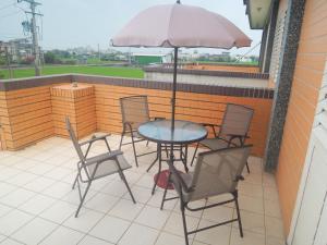 Balkón nebo terasa v ubytování Sweetfishs Homestay