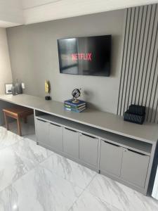 TV a/nebo společenská místnost v ubytování Flat Tropical