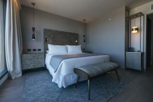 Letto o letti in una camera di Hotel Cabo De Hornos