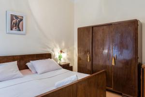 Postel nebo postele na pokoji v ubytování Apartments Bralić