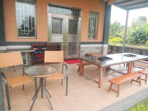 Patio nebo venkovní prostory v ubytování Sweetfishs Homestay