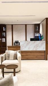 Posezení v ubytování الإقامة الذهبية للشقق المخدومة Golden Residence Hotel