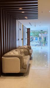 Posezení v ubytování الإقامة الذهبية للشقق المخدومة Golden Residence Hotel