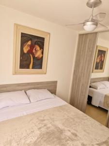 Postel nebo postele na pokoji v ubytování Refúgio Expo Center Norte