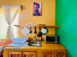 Photo de la galerie de l'établissement Palmar la Punta 9 AC Starlink 2min walk to beach, à Brisas de Zicatela