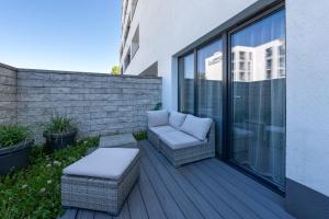 Χώρος καθιστικού στο ApartamentyPrzyMorzu Bałtycki z miejscem postojowym i ogródkiem