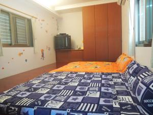 Postel nebo postele na pokoji v ubytování Sweetfishs Homestay