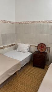 Postelja oz. postelje v sobi nastanitve Miramar GuestHouse