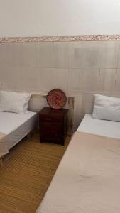 Postelja oz. postelje v sobi nastanitve Miramar GuestHouse