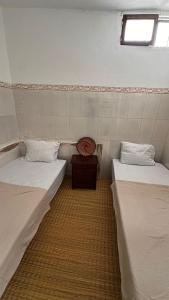 Postelja oz. postelje v sobi nastanitve Miramar GuestHouse