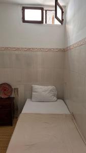 Postelja oz. postelje v sobi nastanitve Miramar GuestHouse