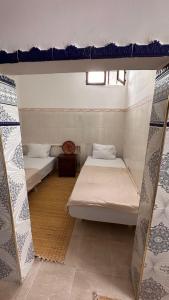 Postelja oz. postelje v sobi nastanitve Miramar GuestHouse