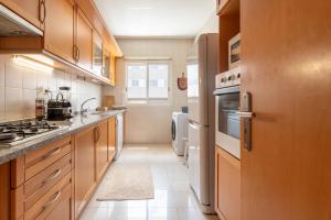 Η κουζίνα ή μικρή κουζίνα στο Modern apartment in Parque das Nações