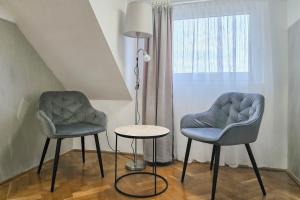 Posedenie v ubytovaní Centrum Charm Apartment